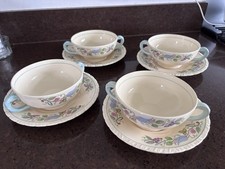 4 Soup Bowls and Saucers. New