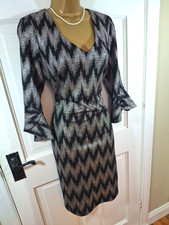 Frank Lyman Black & Silver