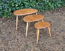 VINTAGE ERCOL PEBBLE NEST OF TABLES
