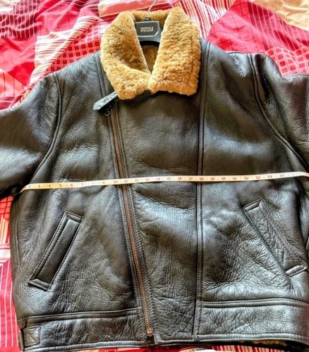 Heavy leather and sheepskin - and,
