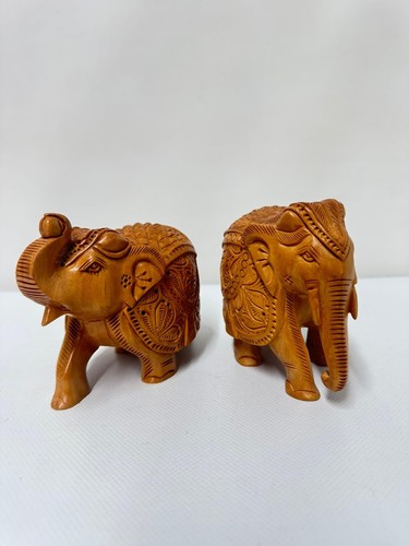 Pair hand carved wooden - of,