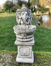 STONE GARDEN GANESH FEEDER ON