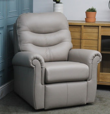 G PLAN HOLMES STATIC ARMCHAIR IN PUTTY LEATHER. RRP £1099.