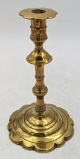 GEORGIAN​ BRASS PETAL-BASE CANDLESTICK 18TH CENTURY