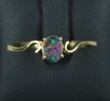 18 Carat Gold and Black Opal Solitaire Ring on Twist