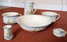 Vintage Falcon Ware Washbasin set with floral motif.
