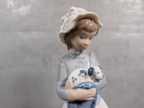 Nao lladro girl with puppy - by,