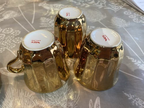 Gold lustre cup and saucer - and,