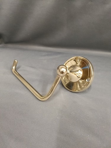 Wall mounted brass towel - mounted,