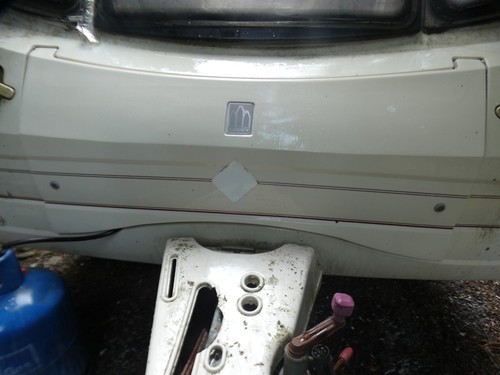 Caravan front gas locker door