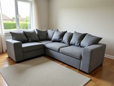 Grey corner sofa bed in good