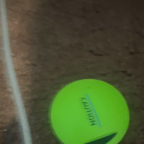 Caution green tennis balls - caution,