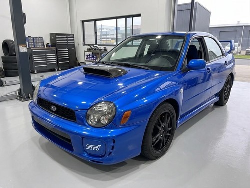 Carbon wrapped larger hood air - wrapped,