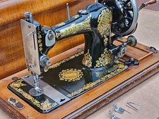 Jones Family C.S hand crank Vintage sewing machine with instruction manual.