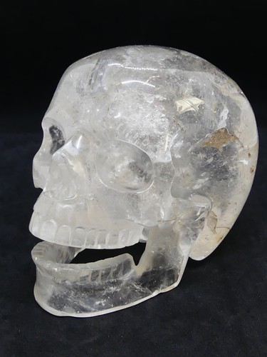 Carved crystal singing skull - crystal,