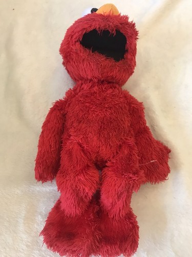 Elmo plush toy works - toy,