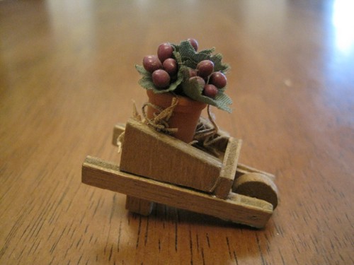 Wooden wheelbarrow with - wooden,