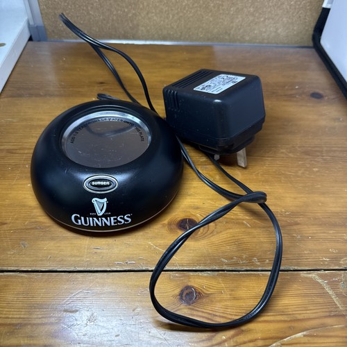 Guinness draft surger with - guinness, uk