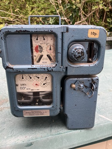 Coin operated electric meter