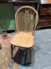 set of six wheel back wooden