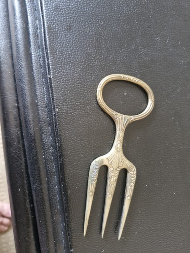 Fork style ornament maybe - fork,