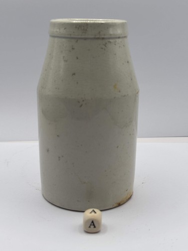 Old white stoneware jar