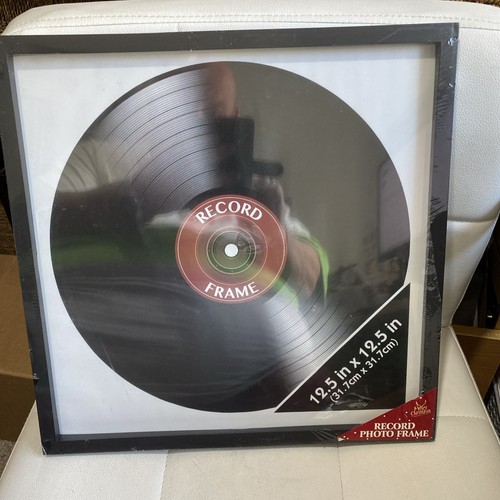 Framing black vinyl record - framing,