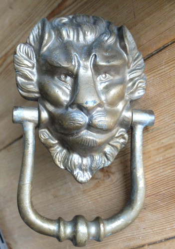 Vintage brass lions - head, door