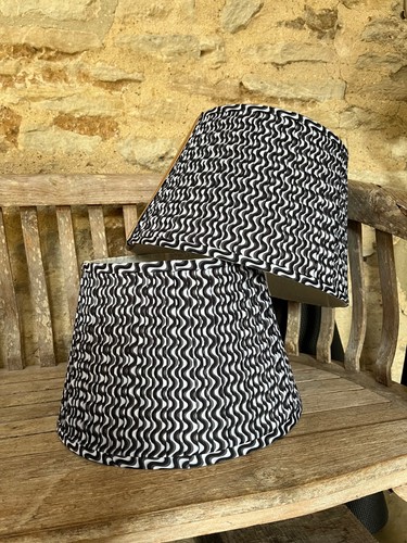 Pair pleated fabric - of,