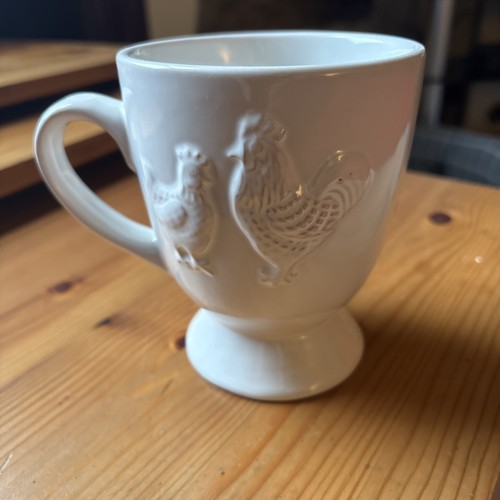 White ceramic mug with an - with,