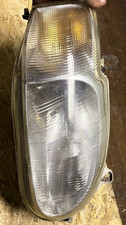 1076554 DRIVER FRONT HEADLIGHT