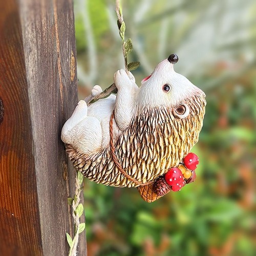Climbing hedgehog hanging - climbing,