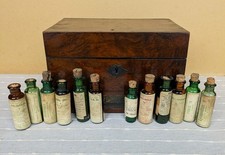 Antique Thompson & Capper Homeopathic apothecary box with bottles