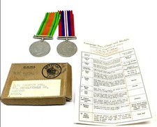 2 x WW2 Medals in original box addressed to I.M. Cameron of Hampton, Middlesex.