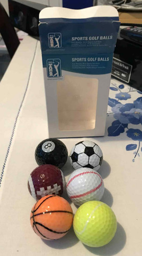 Novelty golfballs - (sports),
