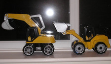 TRACTOR & LOADER.  DIGGER /