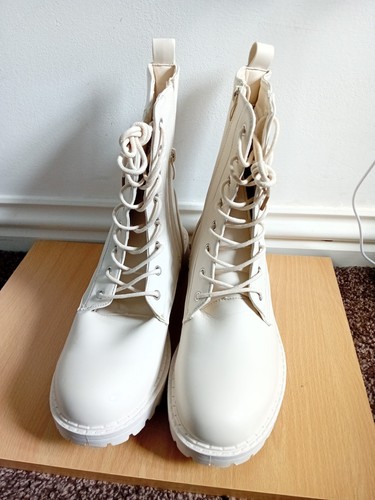 Saw first women s - first, women's