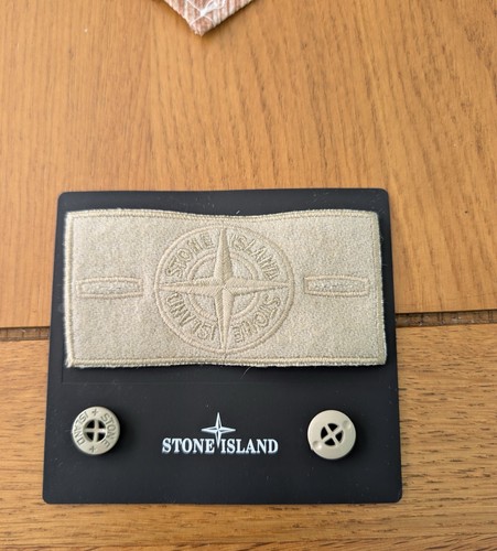 The stone island badge - the, with