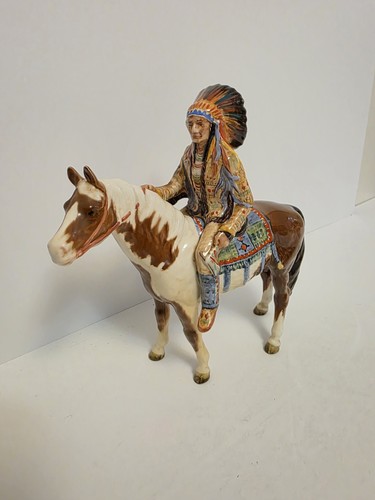 Beswick figurine mounted - of, a
