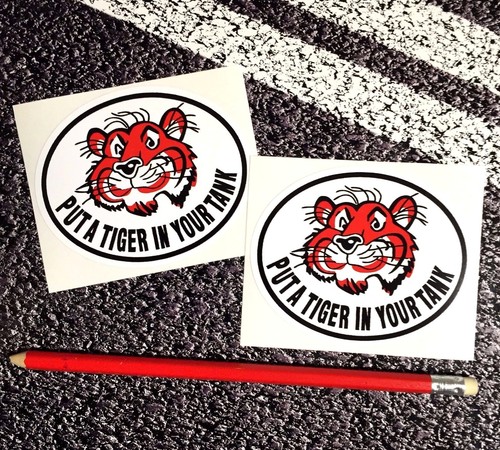 Esso put tiger your - put, a
