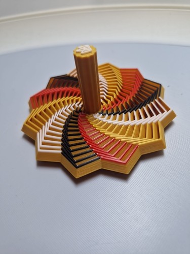 Kinetic spinning top - kinetic,