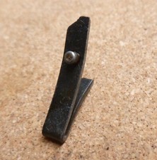 Stirrup catch / latch spring