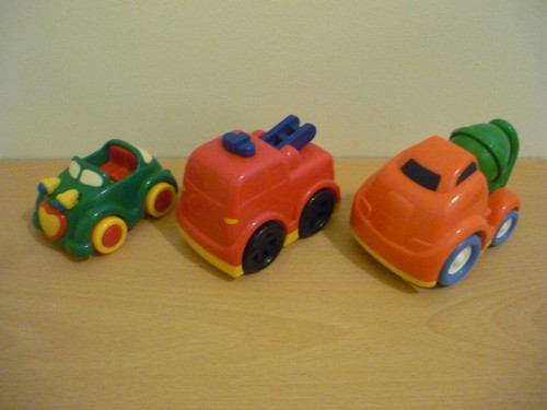 Toy car fire engine - fire, cement