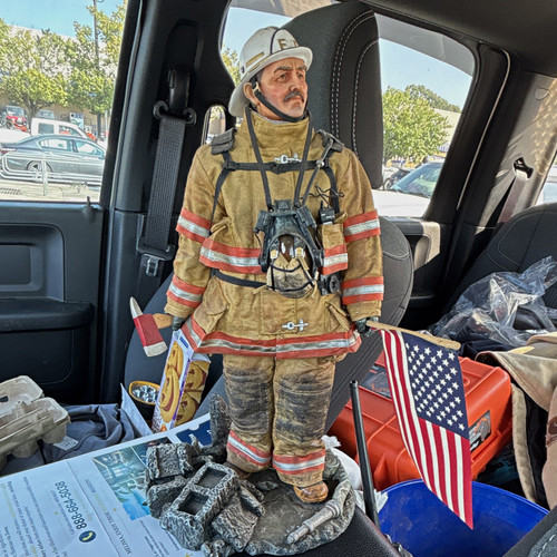 Firefighter figurine statue - figurine,