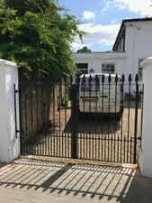 Low wall railing , metal gates