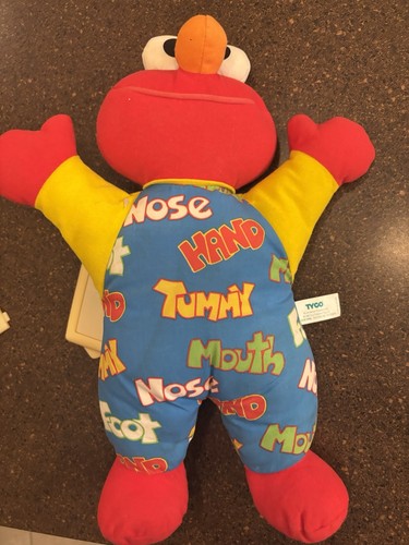 Tyco teach elmo - me,