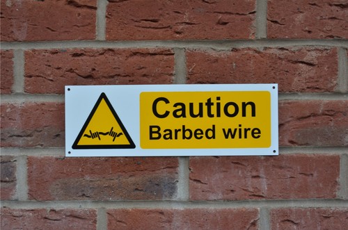 Caution barbed wire - barbed, plastic