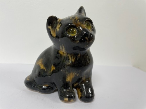 Winstanley calico cat - winstanley, sitting