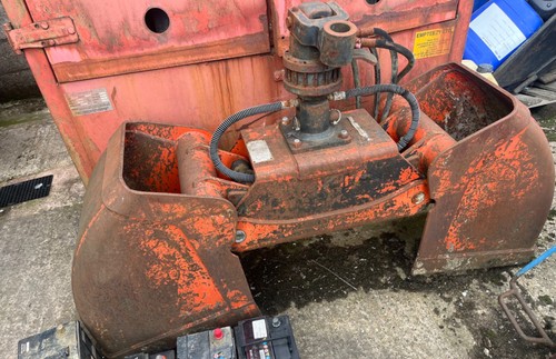 Clamshell bucket with rotor - bucket,,