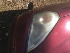 suzuki liana front headlamps both right and left 